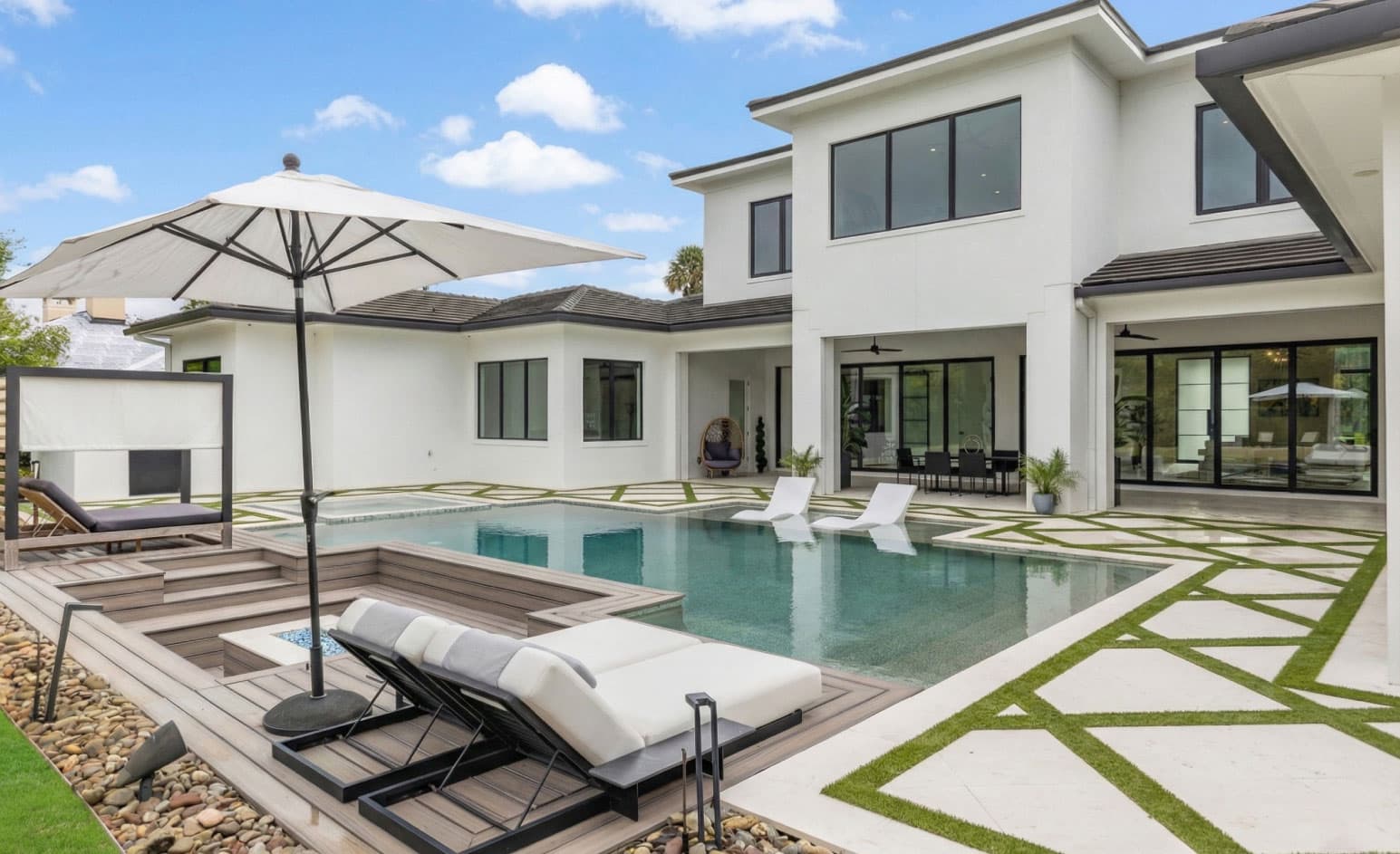 PGT impact windows on a pool home